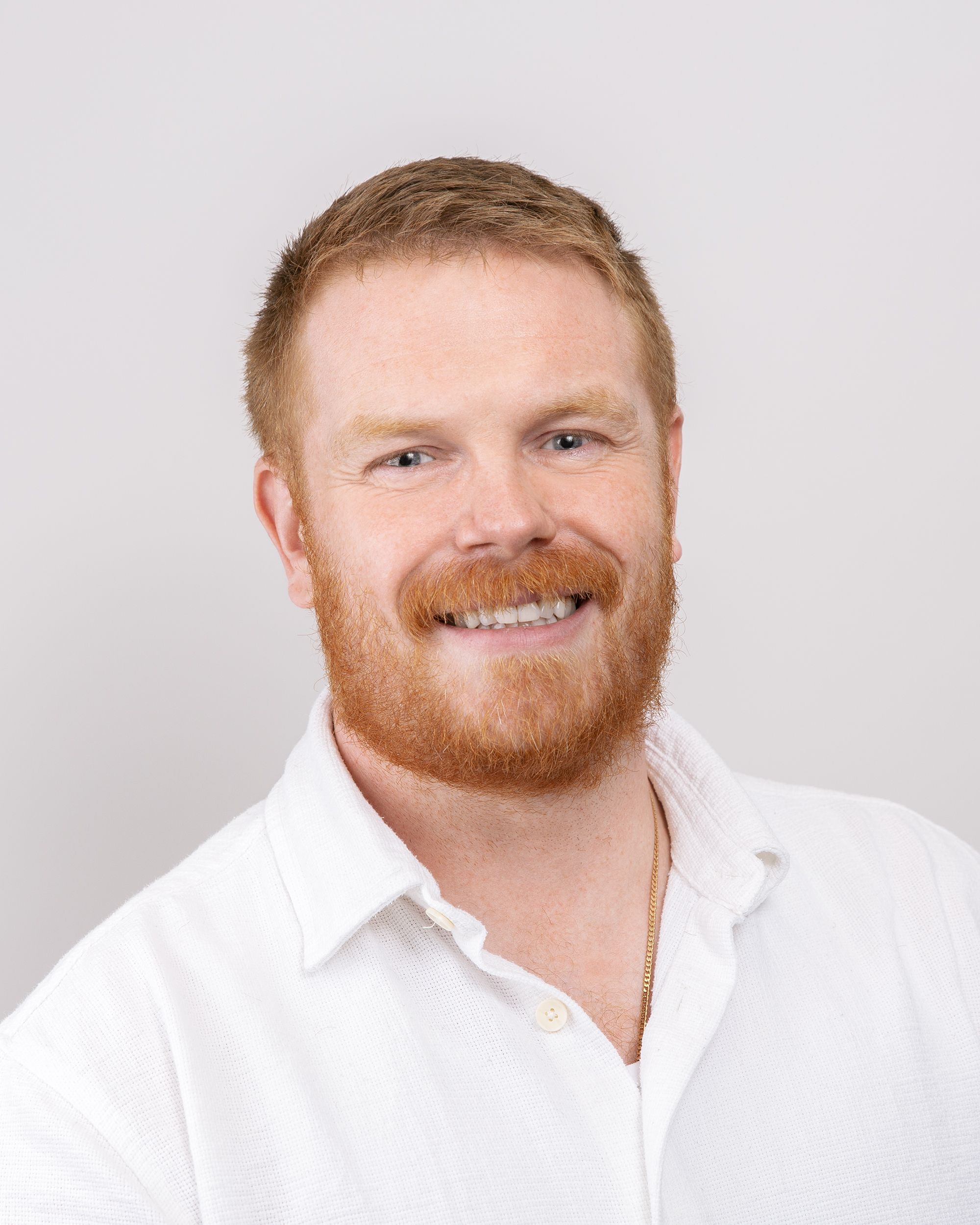 a purple swirl with the letter e inside of it .